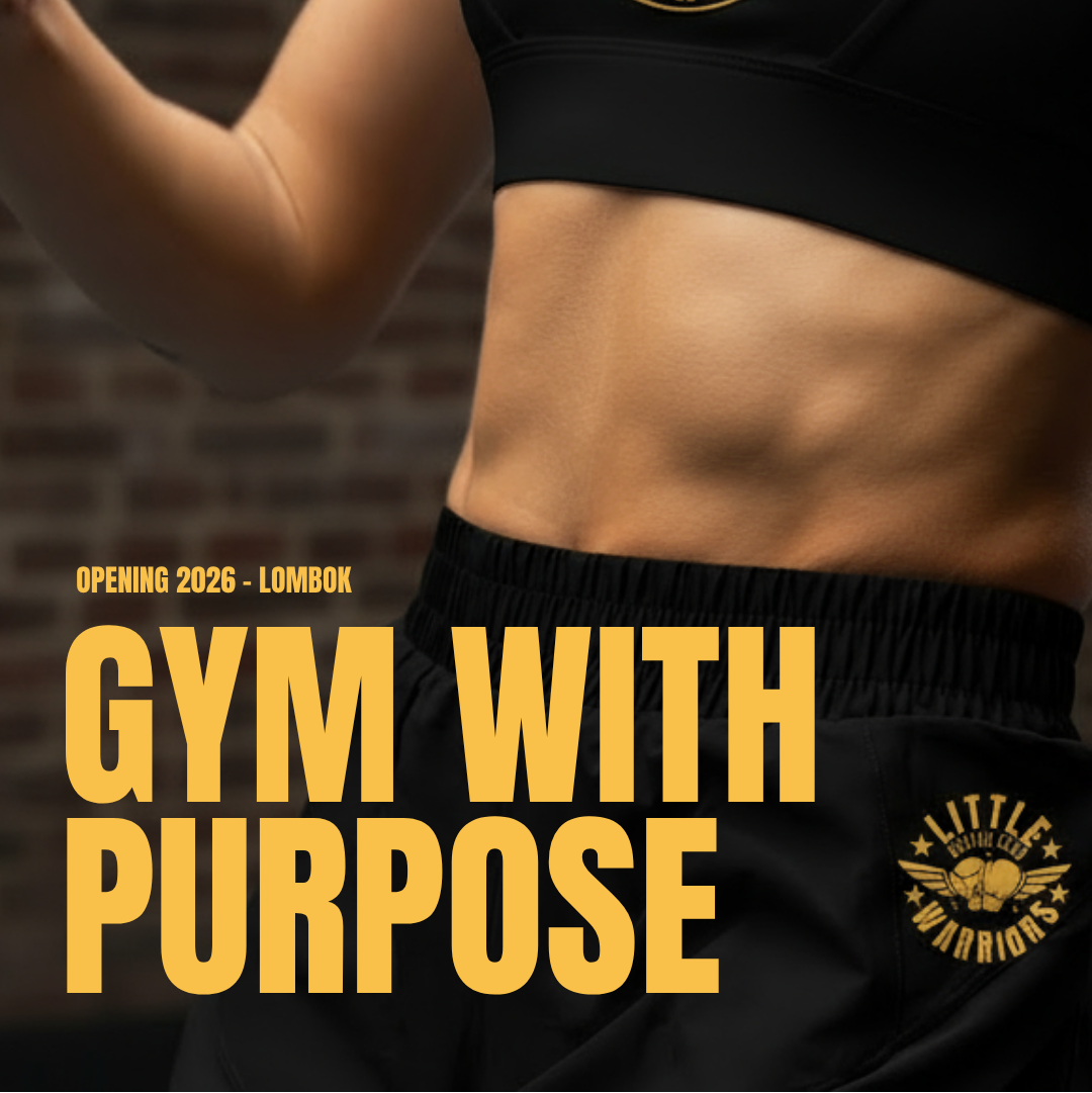 Close-up of a woman wearing black Little Warriors activewear while training in a gym. The sports bra and shorts feature the Little Warriors Boxing Club logo in gold. Bold yellow text on the image reads “Gym With Purpose – Opening 2026, Lombok